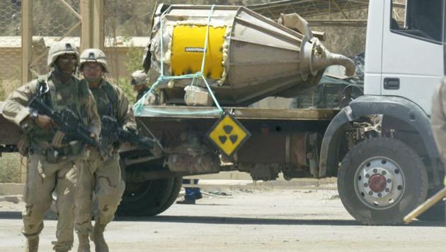 In this June 24, 2003 file photo, US soldiers prepare to escort a canister containing "yellow cake" or Uranium Oxide which was looted during the war from the nuclear facility in Tuwaitha, Iraq.(AP File) In this June 24, 2003 file photo, US soldiers prepare to escort a canister containing "yellow cake" or Uranium Oxide which was looted during the war from the nuclear facility in Tuwaitha, Iraq.(AP File)