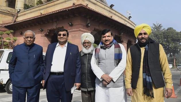 Aam Aadmi Party (AAP) Rajya Sabha members Sanjay Singh (2R), Sushil Gupta (2L) and N D Gupta (L) with party Lok Sabha MPs Sadhu Singh (C) and Bhagwant Mann (R) at Parliament House. Bhagwant Mann resigned as the AAP Punjab unit president on Friday, a day after Arvind Kejriwal apologised to former Akali Dal minister Bikram Majithia for levelling “unfounded allegations” of his involvement in drug trade last year. (Kamal Singh / PTI File) Aam Aadmi Party (AAP) Rajya Sabha members Sanjay Singh (2R), Sushil Gupta (2L) and N D Gupta (L) with party Lok Sabha MPs Sadhu Singh (C) and Bhagwant Mann (R) at Parliament House. Bhagwant Mann resigned as the AAP Punjab unit president on Friday, a day after Arvind Kejriwal apologised to former Akali Dal minister Bikram Majithia for levelling “unfounded allegations” of his involvement in drug trade last year. (Kamal Singh / PTI File)
