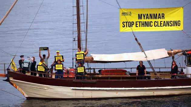 Protesters from Amnesty International display banners regarding the the Rohingya crisis in Myanmar.(Reuters File Photo)