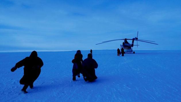 Yamb To children run to a helicopter carrying local electoral commission officials ahead of the presidential election. The area has no roads but politics reaches it anyway, thanks to Maria Uglovaya, her helicopter and a handful of ballot boxes. (Sergei Karpukhin / REUTERS) Yamb To children run to a helicopter carrying local electoral commission officials ahead of the presidential election. The area has no roads but politics reaches it anyway, thanks to Maria Uglovaya, her helicopter and a handful of ballot boxes. (Sergei Karpukhin / REUTERS)