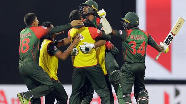 Bangladesh's team members lift their batsman Mahmudullah as they celebrate their team's victory over Sri Lanka. (AP) Bangladesh's team members lift their batsman Mahmudullah as they celebrate their team's victory over Sri Lanka. (AP)