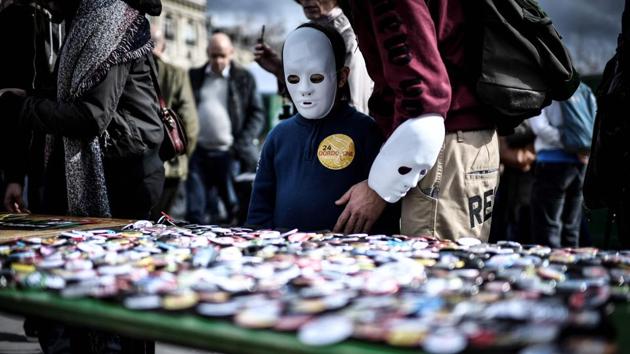 Environmental activists gather to take part in a demonstration called by associations to mark the seventh anniversary of the Fukushima nuclear disaster in Japan. (Stephane De Sakutin / AFP) Environmental activists gather to take part in a demonstration called by associations to mark the seventh anniversary of the Fukushima nuclear disaster in Japan. (Stephane De Sakutin / AFP)