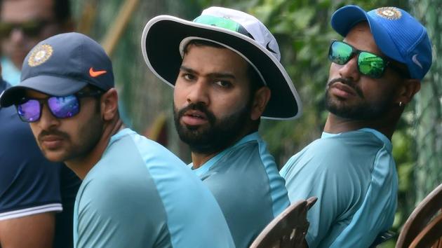 Indian cricket captain Rohit Sharma (C), Shardul Thakur (L) and Shikhar Dhawan (R) take part in a practice session at the R Premadasa Stadium in Colombo on Saturday ahead of the Nidahas Trophy T20 tri-series final against Bangladesh on Sunday. (AFP)
