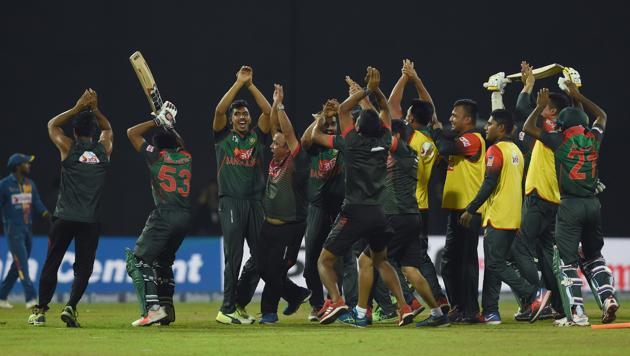 Bangladesh's team members perform a nagin dance as they celebrate their victory over Sri Lanka in the tri-nation Nidahas Trophy at the R. Premadasa stadium in Colombo on March 16.(AFP)