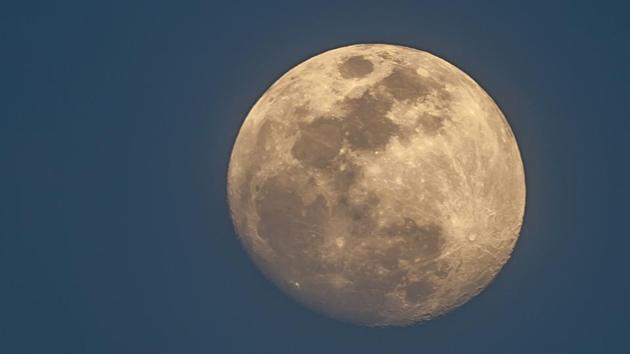 The moon raises over the Universitario stadium in Monterrey, Mexico.(AFP)