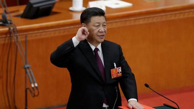Chinese President Xi Jinping with his hand on the Constitution takes the oath, after he is voted as the president for another term, at the fifth plenary session of the National People's Congress (NPC) at the Great Hall of the People in Beijing, China March 17, 2018. (Reuters Photo) Chinese President Xi Jinping with his hand on the Constitution takes the oath, after he is voted as the president for another term, at the fifth plenary session of the National People's Congress (NPC) at the Great Hall of the People in Beijing, China March 17, 2018. (Reuters Photo)