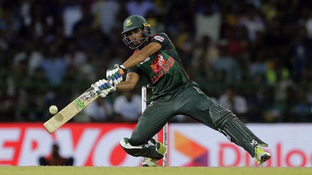 Bangladesh's Mahmudullah plays a shot against Sri Lanka during a T20 Tcricket match in Nidahas tri-series in Colombo on Friday.(AP)