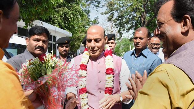 BJP workers in Lucknow welcome Union home minister Rajnath Singh on Saturday. (PTI) BJP workers in Lucknow welcome Union home minister Rajnath Singh on Saturday. (PTI)