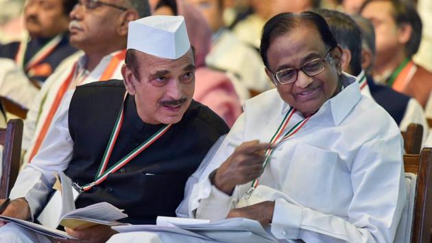 Senior Congress leader Ghulam Nabi Azad with former finance minister P Chidambaram during the second day of the 84th Plenary Session of Indian National Congress at the Indira Gandhi stadium in New Delhi on Sunday. (PTI Photo) Senior Congress leader Ghulam Nabi Azad with former finance minister P Chidambaram during the second day of the 84th Plenary Session of Indian National Congress at the Indira Gandhi stadium in New Delhi on Sunday. (PTI Photo)