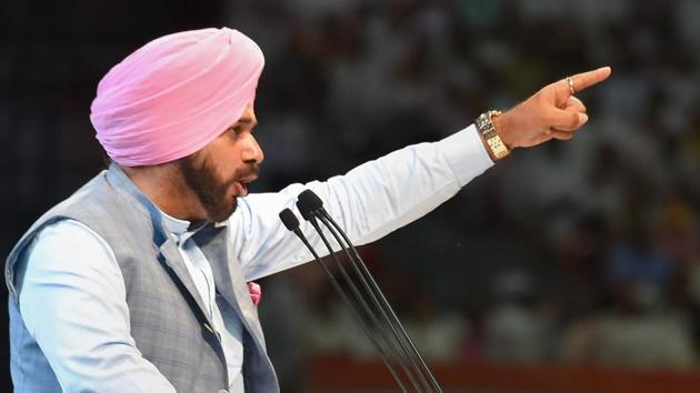 Punjab local bodies and tourism minister Navjot Singh Sidhu speaks during the second day of the 84th Plenary Session of the Indian National Congress (INC) at IG Stadium in New Delhi on Sunday.(PTI Photo)