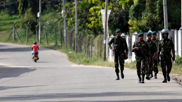 Sri Lanka Special Task Force soldiers patrol along a road after a clash between two communities in Digana, central district of Kandy, Sri Lanka March 8, 2018. (Reuters Photo)