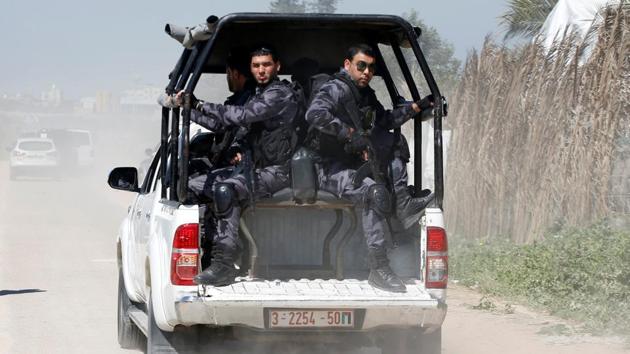 Members of Palestinian Hamas security forces in the northern Gaza Strip on March 13. (Reuters Photo) Members of Palestinian Hamas security forces in the northern Gaza Strip on March 13. (Reuters Photo)