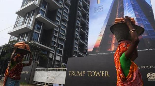 Labourers work on the road leading to the under-construction Trump Tower in Kolkata on February 20, 2018. (AFP Photo) Labourers work on the road leading to the under-construction Trump Tower in Kolkata on February 20, 2018. (AFP Photo)