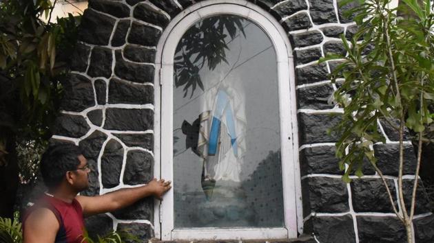 The glass enclosure at St Sebastian Church, in Navi Mumbai, which was broken by unidentified persons on Friday. (HT Photo) The glass enclosure at St Sebastian Church, in Navi Mumbai, which was broken by unidentified persons on Friday. (HT Photo)