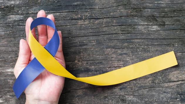 The blue yellow awareness ribbon for Down Syndrome Day.(Shutterstock) The blue yellow awareness ribbon for Down Syndrome Day.(Shutterstock)
