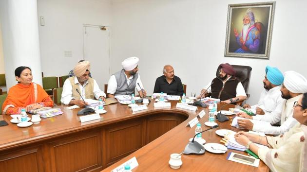 Punjab chief minister Captain Amarinder Singh presiding over the Cabinet meeting at CMO, Chandigarh on Monday. (HT Photo) Punjab chief minister Captain Amarinder Singh presiding over the Cabinet meeting at CMO, Chandigarh on Monday. (HT Photo)