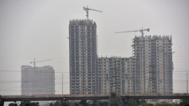 Noida, India - Feb. 12, 2018: Under Construction building, in Noida, India, on Monday, February 12, 2018. (Photo by Virendra Singh Gosain/ Hindustan Times) (To go with Vinod Rajput’s story) (Virendra Singh Gosain/HT PHOTO) Noida, India - Feb. 12, 2018: Under Construction building, in Noida, India, on Monday, February 12, 2018. (Photo by Virendra Singh Gosain/ Hindustan Times) (To go with Vinod Rajput’s story) (Virendra Singh Gosain/HT PHOTO)