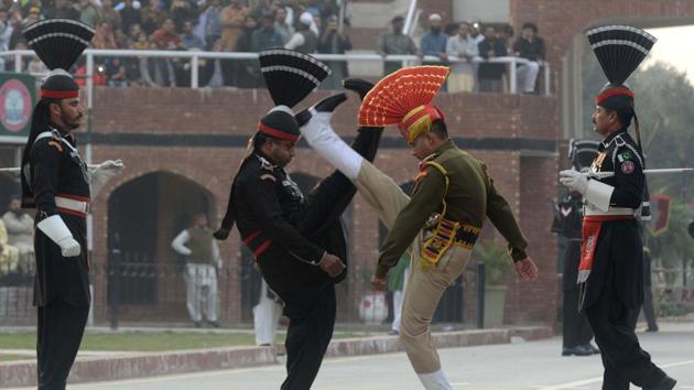 Pakistani Rangers and Indian Border Security Force personnel take part in the daily beating of the retreat ceremony at the India-Pakistan Wagah Border Post. (AFP File) Pakistani Rangers and Indian Border Security Force personnel take part in the daily beating of the retreat ceremony at the India-Pakistan Wagah Border Post. (AFP File)