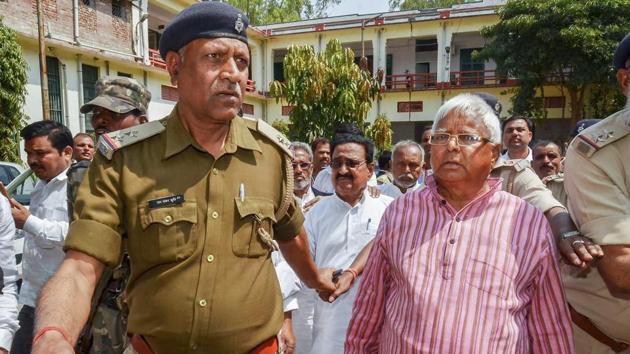 RJD chief Lalu Prasad Yadav arrives at the special CBI court in connection with multi-crore fodder scam case in Ranchi on Thursday. (PTI Photo) RJD chief Lalu Prasad Yadav arrives at the special CBI court in connection with multi-crore fodder scam case in Ranchi on Thursday. (PTI Photo)