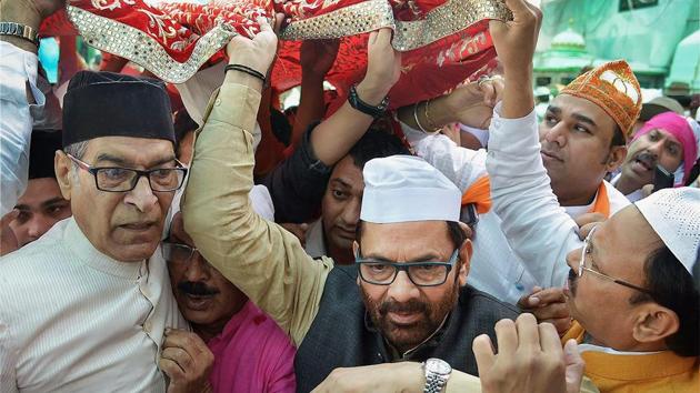 Union minister Mukhtar Abbas Naqvi offers 'Chadar' at the majar of Sufi saint Khwaja Moinduddin Chisti in Ajmer Sharif on behalf of Prime Minister Narendra Modi, on Monday. (PTI) Union minister Mukhtar Abbas Naqvi offers 'Chadar' at the majar of Sufi saint Khwaja Moinduddin Chisti in Ajmer Sharif on behalf of Prime Minister Narendra Modi, on Monday. (PTI)