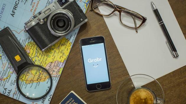 There’s an app that aims to expand that practice beyond friends and family and turn complete strangers into couriers. (Bloomberg) There’s an app that aims to expand that practice beyond friends and family and turn complete strangers into couriers. (Bloomberg)