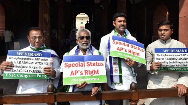 YSR Congress party members hold placards demanding special status for the state of Andhra Pradesh during the Parliament session in New Delhi on Friday. (PTI Photo) YSR Congress party members hold placards demanding special status for the state of Andhra Pradesh during the Parliament session in New Delhi on Friday. (PTI Photo)