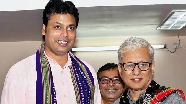 Tripura chief minister Biplab Kumar Deb, flanked by deputy chief minister Jishnu Dev Varma after an oath-taking ceremony in Agartala on Wednesday. (PTI Photo) Tripura chief minister Biplab Kumar Deb, flanked by deputy chief minister Jishnu Dev Varma after an oath-taking ceremony in Agartala on Wednesday. (PTI Photo)
