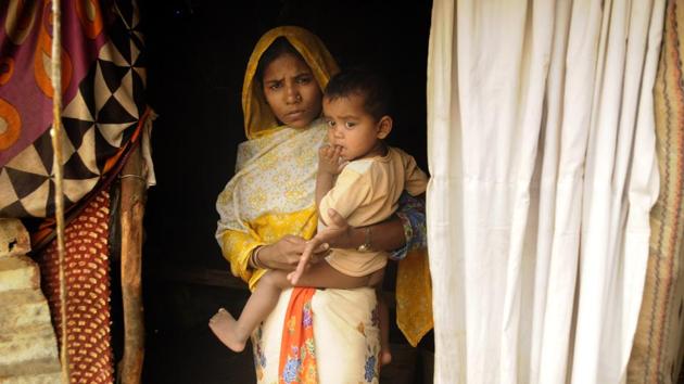 Daiya Begum, a Rohingya refugee with her daughter poses for a photograph in front of her makeshift home in Baruipur, West Bengal. The Supreme Court directed the Centre to file a “comprehensive status report” giving details of conditions in Rohingya refugee camps in various states. The plea alleged that poor and unhygienic conditions at these camps have led to several deaths recently. (Samir Jana / HT File) Daiya Begum, a Rohingya refugee with her daughter poses for a photograph in front of her makeshift home in Baruipur, West Bengal. The Supreme Court directed the Centre to file a “comprehensive status report” giving details of conditions in Rohingya refugee camps in various states. The plea alleged that poor and unhygienic conditions at these camps have led to several deaths recently. (Samir Jana / HT File)