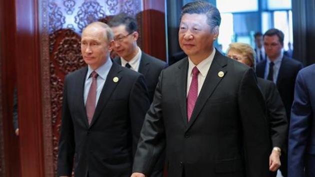 Russia's President Vladimir Putin (L) with Chinese President Xi Jinping attends the Roundtable Summit Phase One Sessions of Belt and Road Forum at the International Conference Center in Yanqi Lake on May 15, 2017 in Beijing, China. (REUTERS File Photo) Russia's President Vladimir Putin (L) with Chinese President Xi Jinping attends the Roundtable Summit Phase One Sessions of Belt and Road Forum at the International Conference Center in Yanqi Lake on May 15, 2017 in Beijing, China. (REUTERS File Photo)