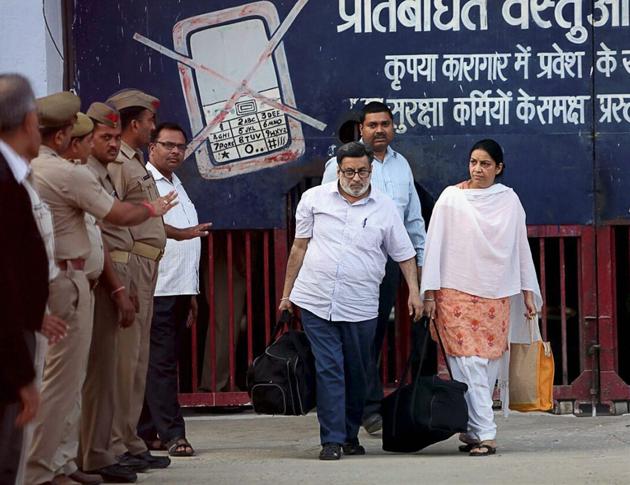 Dentist-couple Nupur and Rajesh Talwar coming out of the Dasna Jail in Ghaziabad on Monday.(PTI Photo)