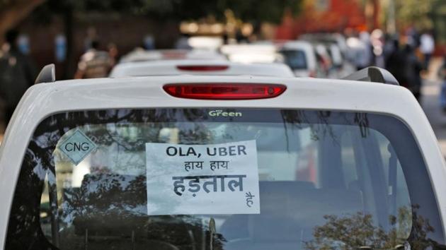 Drivers for app-based cab aggregators Uber and Ola started an indefinite strike across India on Monday, demanding extra pay as a surge in the number of cabs on the two platforms, coupled with cutbacks in incentive payments, have stung drivers. The strike, which began at midnight on Sunday, centred on Mumbai and was called by political party Maharashtra Navnirman Sena’s (MNS) transport union. (Adnan Abidi / REUTERS File) Drivers for app-based cab aggregators Uber and Ola started an indefinite strike across India on Monday, demanding extra pay as a surge in the number of cabs on the two platforms, coupled with cutbacks in incentive payments, have stung drivers. The strike, which began at midnight on Sunday, centred on Mumbai and was called by political party Maharashtra Navnirman Sena’s (MNS) transport union. (Adnan Abidi / REUTERS File)