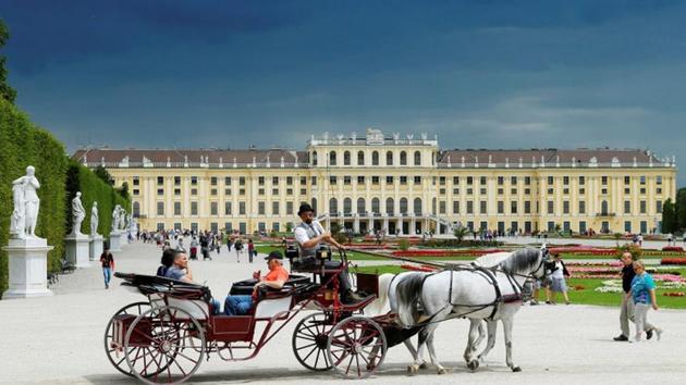 A traditional Fiaker horse carriage passes imperial Schoenbrunn palace in Vienna. (REUTERS) A traditional Fiaker horse carriage passes imperial Schoenbrunn palace in Vienna. (REUTERS)