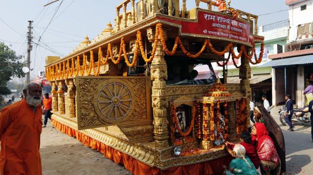 Women offer prayers on a bus accompanying ‘Ram Rajya Rath Yatra’ as it prepares to leave for Rameswaram, from Allahabad. (AP File Photo) Women offer prayers on a bus accompanying ‘Ram Rajya Rath Yatra’ as it prepares to leave for Rameswaram, from Allahabad. (AP File Photo)