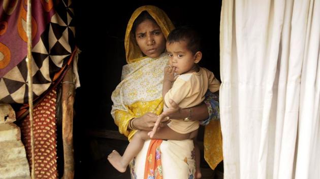 “In Mewat and Nuh, people were so distressed that some of the families sold their kids for a few thousand rupees for working as rag-pickers and domestic helps,” said Daiya Begum. With her husband Muhammad Sharif, and five children, she came here in mid-February. Her father Abdus Sukur and mother Dolu Begum were killed – ‘burnt alive’ she alleged – in Myanmar. (Samir Jana / HT Photo) “In Mewat and Nuh, people were so distressed that some of the families sold their kids for a few thousand rupees for working as rag-pickers and domestic helps,” said Daiya Begum. With her husband Muhammad Sharif, and five children, she came here in mid-February. Her father Abdus Sukur and mother Dolu Begum were killed – ‘burnt alive’ she alleged – in Myanmar. (Samir Jana / HT Photo)