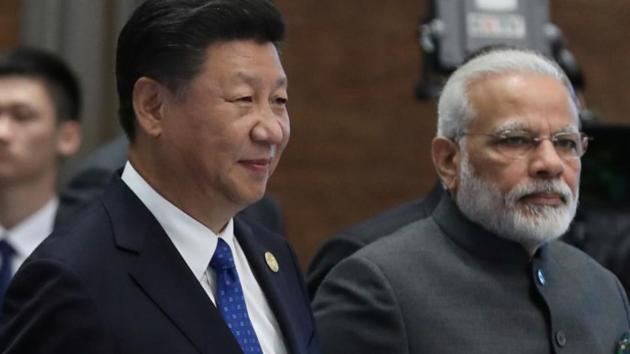 Chinese President Xi Jinping and Prime Minister Narendra Modi at the 2017 BRICS Summit in Xiamen, China.(Reuters File Photo)