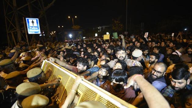 Security personnel stop students during their protest against a JNU professor, who is accused of sexually harassing female students, at Vasant Kunj Police Station in New Delhi on Monday. (PTI Photo) Security personnel stop students during their protest against a JNU professor, who is accused of sexually harassing female students, at Vasant Kunj Police Station in New Delhi on Monday. (PTI Photo)