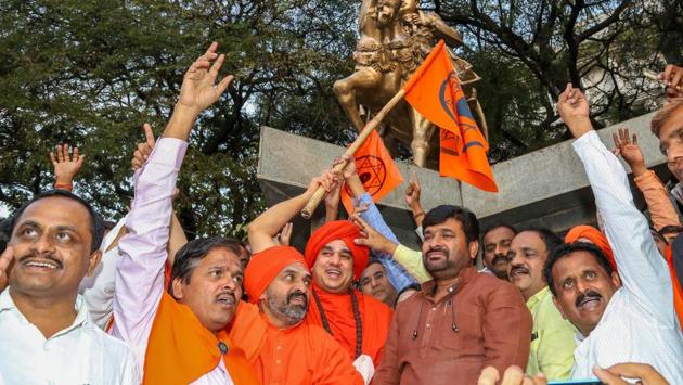Karnataka minister for mines and geology Vinay Kulkarni with Jaya Mruthyunjaya Swamiji of Kudalasangama Panchamasali Peetha and his followers after the state government decided to write to the Centre to grant religious minority status to the Lingayat community, in Bengaluru on Monday. (PTI) Karnataka minister for mines and geology Vinay Kulkarni with Jaya Mruthyunjaya Swamiji of Kudalasangama Panchamasali Peetha and his followers after the state government decided to write to the Centre to grant religious minority status to the Lingayat community, in Bengaluru on Monday. (PTI)