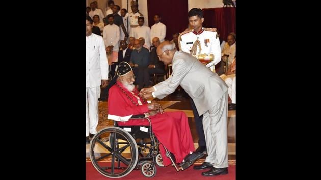 Emeritus Metropolitan bishop of the Mar Thoma Syrian Church Philipose Mar Chrysostomi is presented the Padma Bhusan award by the president. Other notable dignitaries conferred with the country’s third highest civilian award include Ramachandran Nagaswamy, an expert in Indian art; professor Ved Prakash Nanda, a John Evans Distinguished Professor at University of Denver; and Pandit Arvind Parikh, one of India’s top sitar players. (Ajay Aggarwal / HT Photo) Emeritus Metropolitan bishop of the Mar Thoma Syrian Church Philipose Mar Chrysostomi is presented the Padma Bhusan award by the president. Other notable dignitaries conferred with the country’s third highest civilian award include Ramachandran Nagaswamy, an expert in Indian art; professor Ved Prakash Nanda, a John Evans Distinguished Professor at University of Denver; and Pandit Arvind Parikh, one of India’s top sitar players. (Ajay Aggarwal / HT Photo)