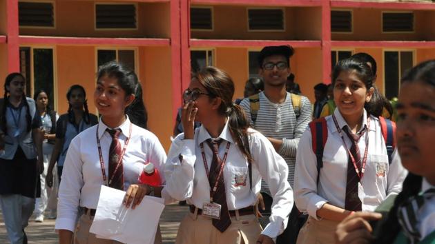 Students coming out of Carmel Convent school after appearing in CBSE Class 12 math paper in Bhopal on Wednesday. (Mujeeb Faruqui/HT Photo)