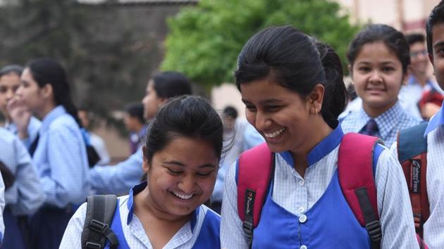 Students of CBSE board class 12 coming out from the examination centre after appearing in their math paper at Cathedral Sr School in Lucknow on Wednesday. (Subhankar Chakraborty/HT PHOTO)