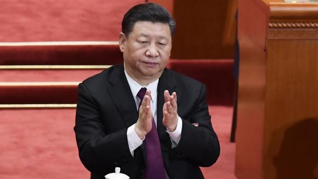 (FILES) This file picture taken on March 20, 2018 shows Chinese President Xi Jinping applauding during the closing session of the National People's Congress at the Great Hall of the People in Beijing. (AFP) (FILES) This file picture taken on March 20, 2018 shows Chinese President Xi Jinping applauding during the closing session of the National People's Congress at the Great Hall of the People in Beijing. (AFP)