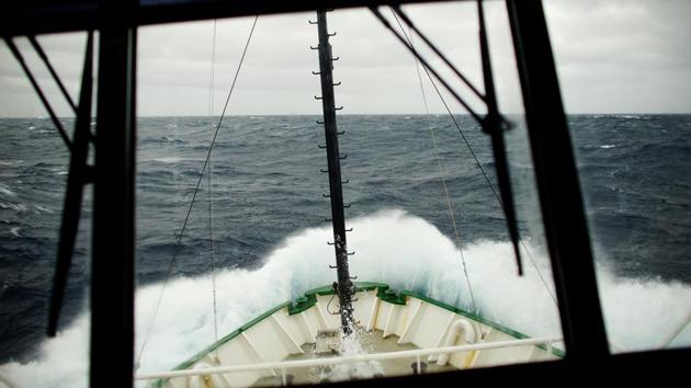 Waves break on the Arctic Sunrise at the Drake Passage as it navigates towards Antarctica. Meneghini describes leaving Chile and entering the open sea towards Antarctica with a sense of freedom. Crossing the Drake Passage however, the point where the Atlantic and the Pacific Oceans violently collide, is a rough four days of being in a centrifuge. (Alexandre Meneghini / REUTERS) Waves break on the Arctic Sunrise at the Drake Passage as it navigates towards Antarctica. Meneghini describes leaving Chile and entering the open sea towards Antarctica with a sense of freedom. Crossing the Drake Passage however, the point where the Atlantic and the Pacific Oceans violently collide, is a rough four days of being in a centrifuge. (Alexandre Meneghini / REUTERS)