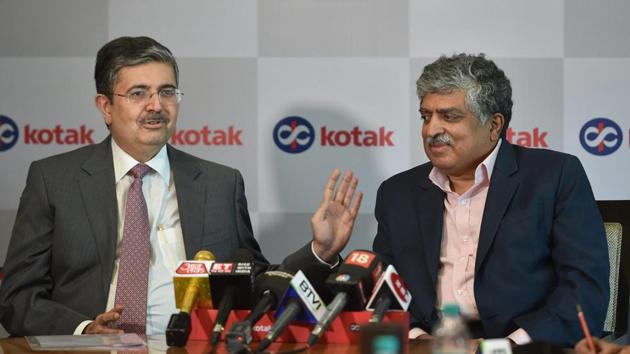 Vice-chairperson and managing director of Kotak Mahindra Bank Uday Kotak speaks as Infosys co-founder & non-executive chairperson Nandan Nilekani looks on, during a press conference in Mumbai on Tuesday.(PTI Photo) Vice-chairperson and managing director of Kotak Mahindra Bank Uday Kotak speaks as Infosys co-founder & non-executive chairperson Nandan Nilekani looks on, during a press conference in Mumbai on Tuesday.(PTI Photo)