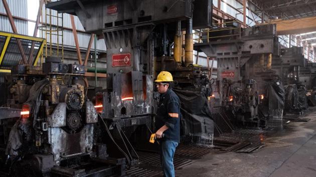 A worker oversees the production of steel billets at a facility in Mexico on March 6, 2018. (Bloomberg Photo) A worker oversees the production of steel billets at a facility in Mexico on March 6, 2018. (Bloomberg Photo)