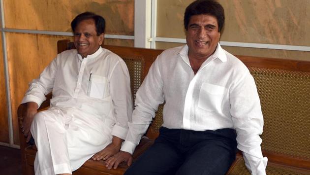 Rajya Sabha MP Ahmed Patel (L) and Raj Babbar (R) share a moment before a press conference during the Parliament budget session in New Delhi. Uttar Pradesh Congress Committee (UPCC) president Raj Babbar has offered to resign from his post, sources close to him said. “Yes, Babbar has offered to resign and the party high command will now take a decision on it,” said a senior Congress leader seeking anonymity. (Sonu Mehta / HT Photo) Rajya Sabha MP Ahmed Patel (L) and Raj Babbar (R) share a moment before a press conference during the Parliament budget session in New Delhi. Uttar Pradesh Congress Committee (UPCC) president Raj Babbar has offered to resign from his post, sources close to him said. “Yes, Babbar has offered to resign and the party high command will now take a decision on it,” said a senior Congress leader seeking anonymity. (Sonu Mehta / HT Photo)