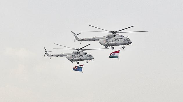 Helicopters fly with the Tricolour at the Halwara Air Force Station near Ludhiana on Thursday. (Gurminder Singh/HT)