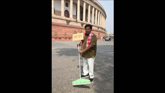 In his most recent appearance at Parliament he was seen continuing this protest dressed as a Swachh Bharat worker armed with a wiper on March 22. (Arvind Yadav/ HT Photo) 