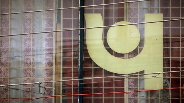 The logo of Punjab National Bank (PNB) is seen on a branch office window in New Delhi on February 27. (Reuters) The logo of Punjab National Bank (PNB) is seen on a branch office window in New Delhi on February 27. (Reuters)