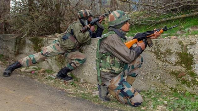 Army personnel stand guard as at least four militants and four security personnel were killed during an encounter, at Halmatpora in Kupwara district of North Kashmir on Wednesday. (PTI) Army personnel stand guard as at least four militants and four security personnel were killed during an encounter, at Halmatpora in Kupwara district of North Kashmir on Wednesday. (PTI)