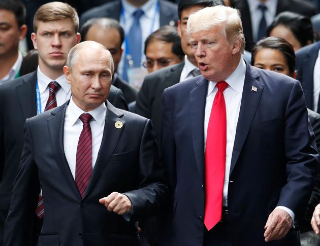 US President Donald Trump (right) and Russian President Vladimir Putin at the Asia-Pacific Economic Cooperation (APEC) leaders' summit in Da Nang, Vietnam on November 11, 2017. (AFP) US President Donald Trump (right) and Russian President Vladimir Putin at the Asia-Pacific Economic Cooperation (APEC) leaders' summit in Da Nang, Vietnam on November 11, 2017. (AFP)